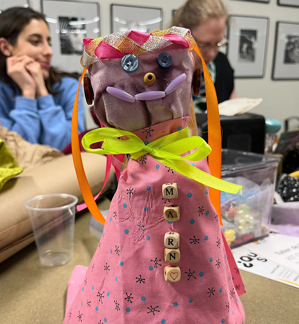 A doll made out of crafting materials