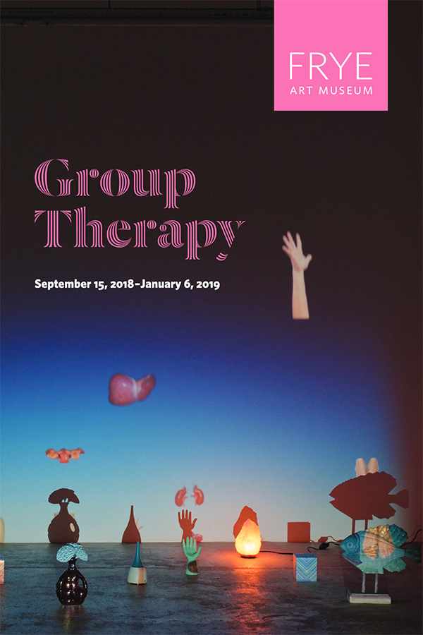Exhibition cover with photo of small sculpture on the ground and their shadows on a wall behind
