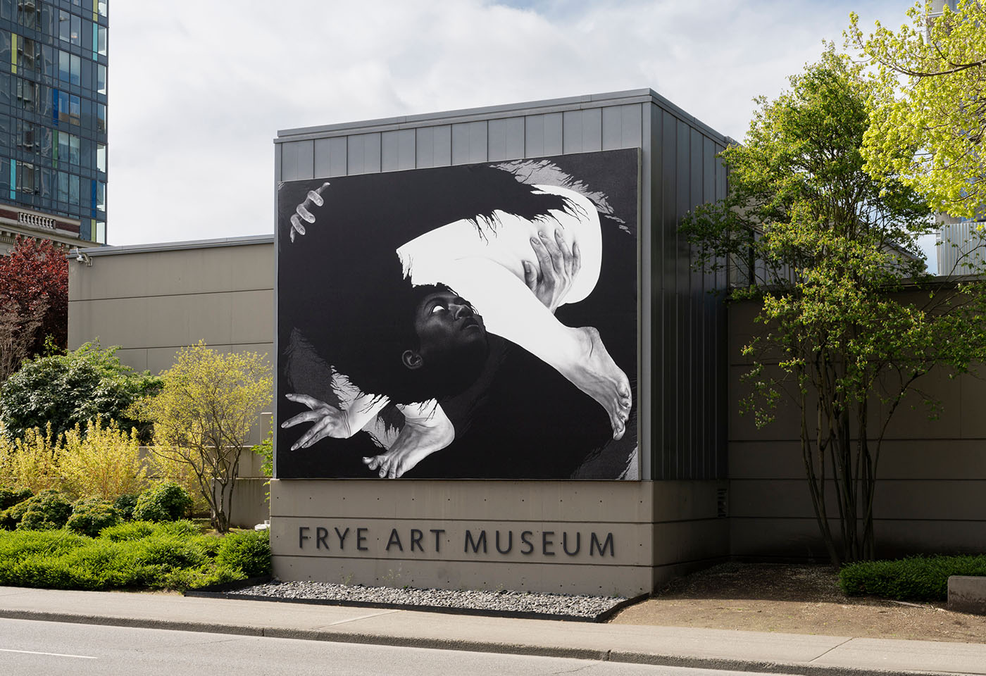 A banner of an artwork by Samantha Wall on the side of the Frye Art Museum