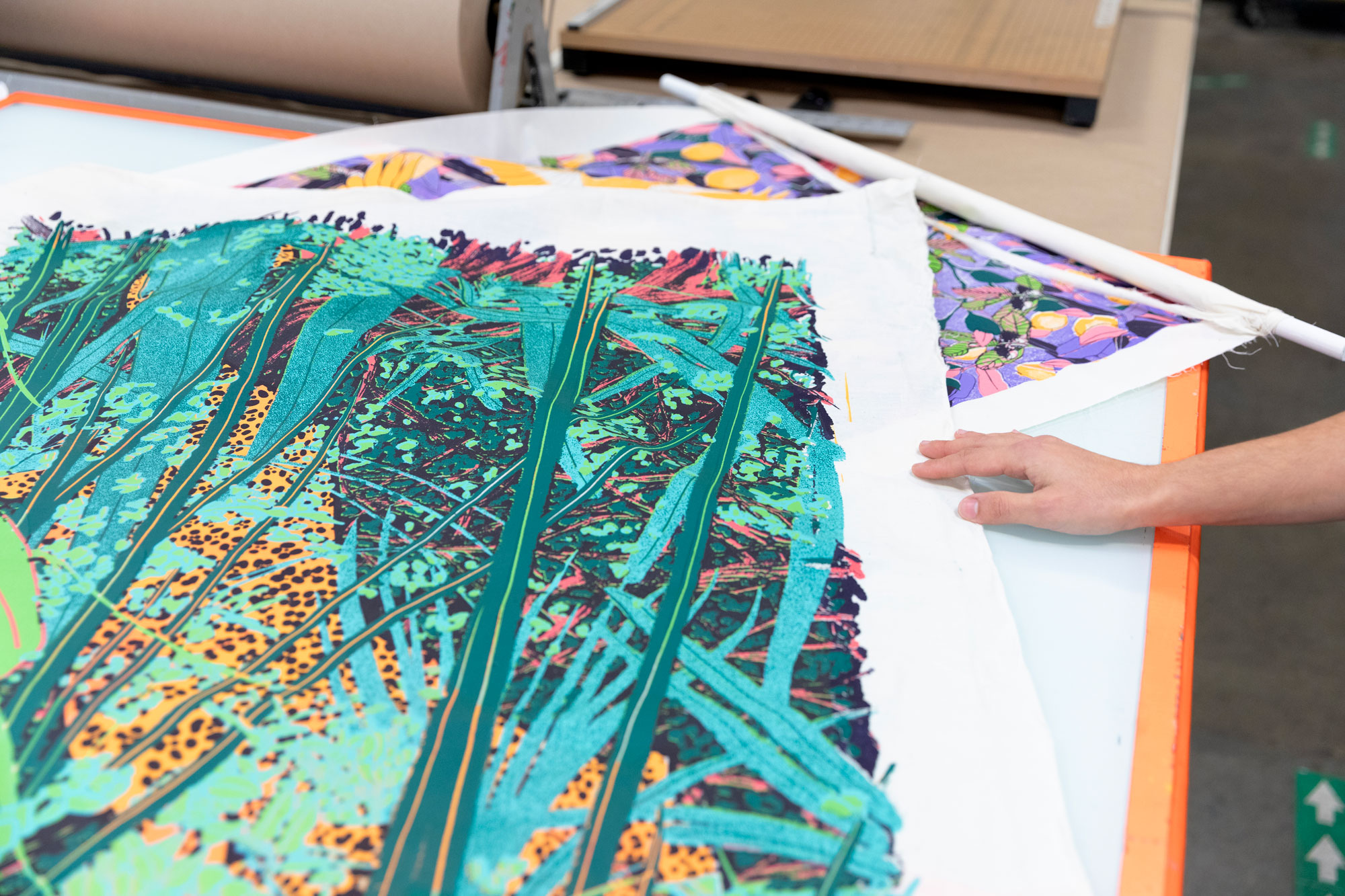 Bright green screenprint with leaves and lots of texture