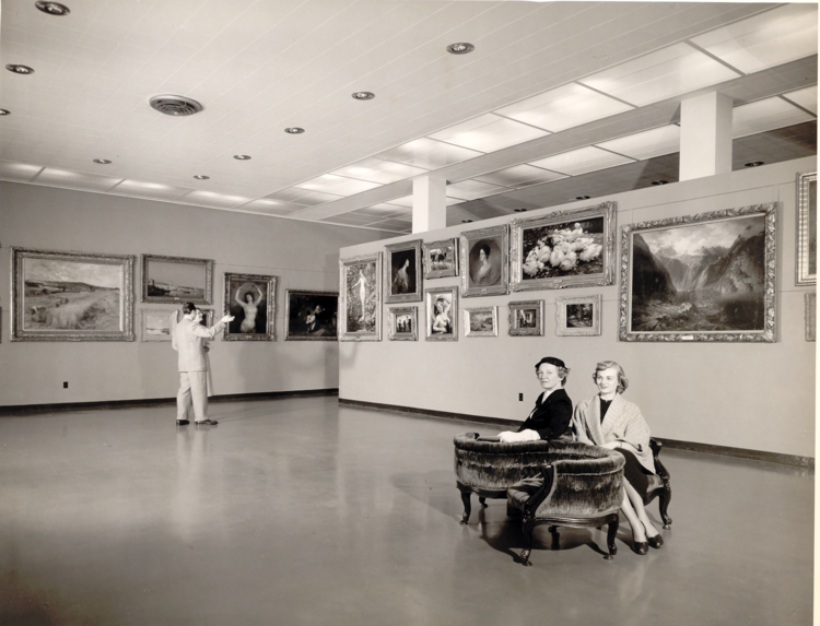 Interior of the museum with Kay Greathouse and Norma Wissman seated in gossip chair. 