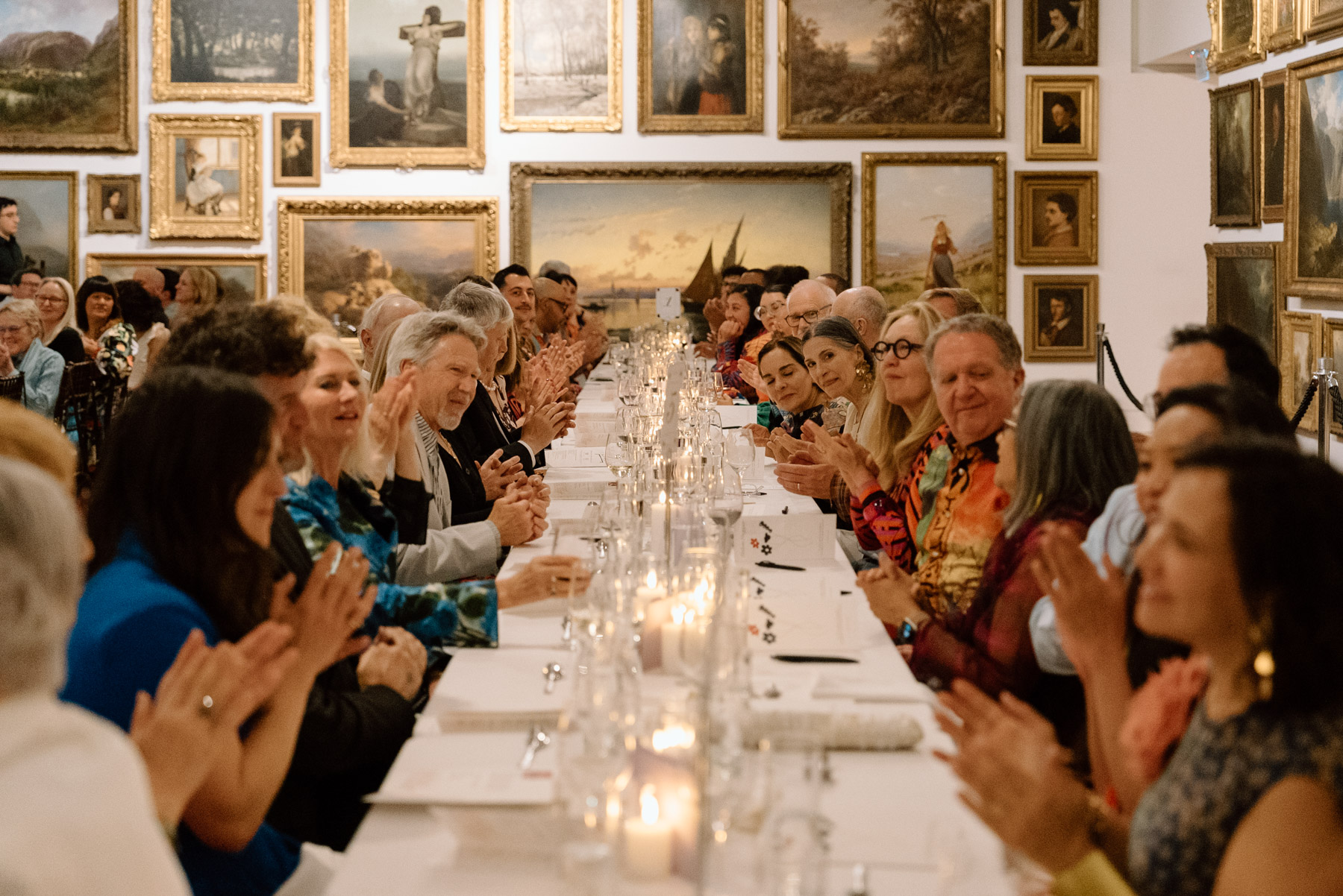 A view down a long, well-laid dinner table