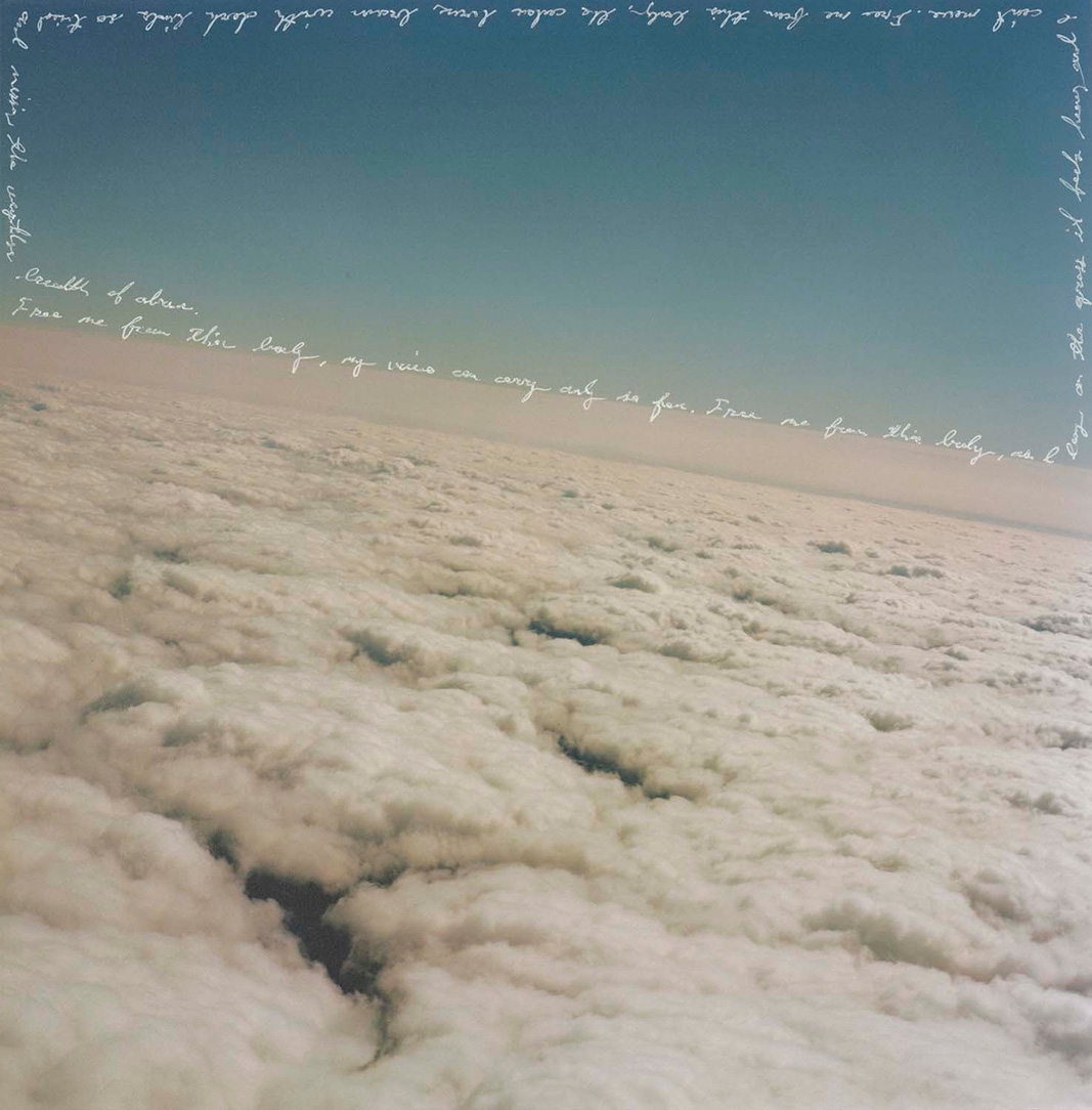 Sky Hopinka inkjet print of clouds and a blue sky with white cursive lettering along the edges