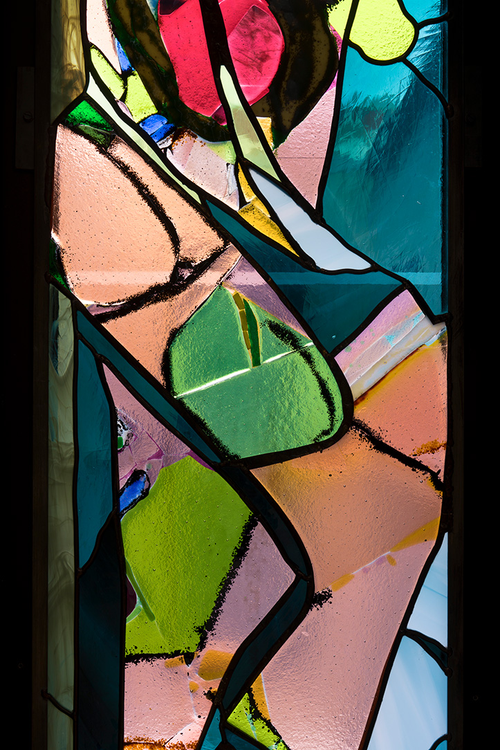 A detail photo of a larger stained glass artwork
