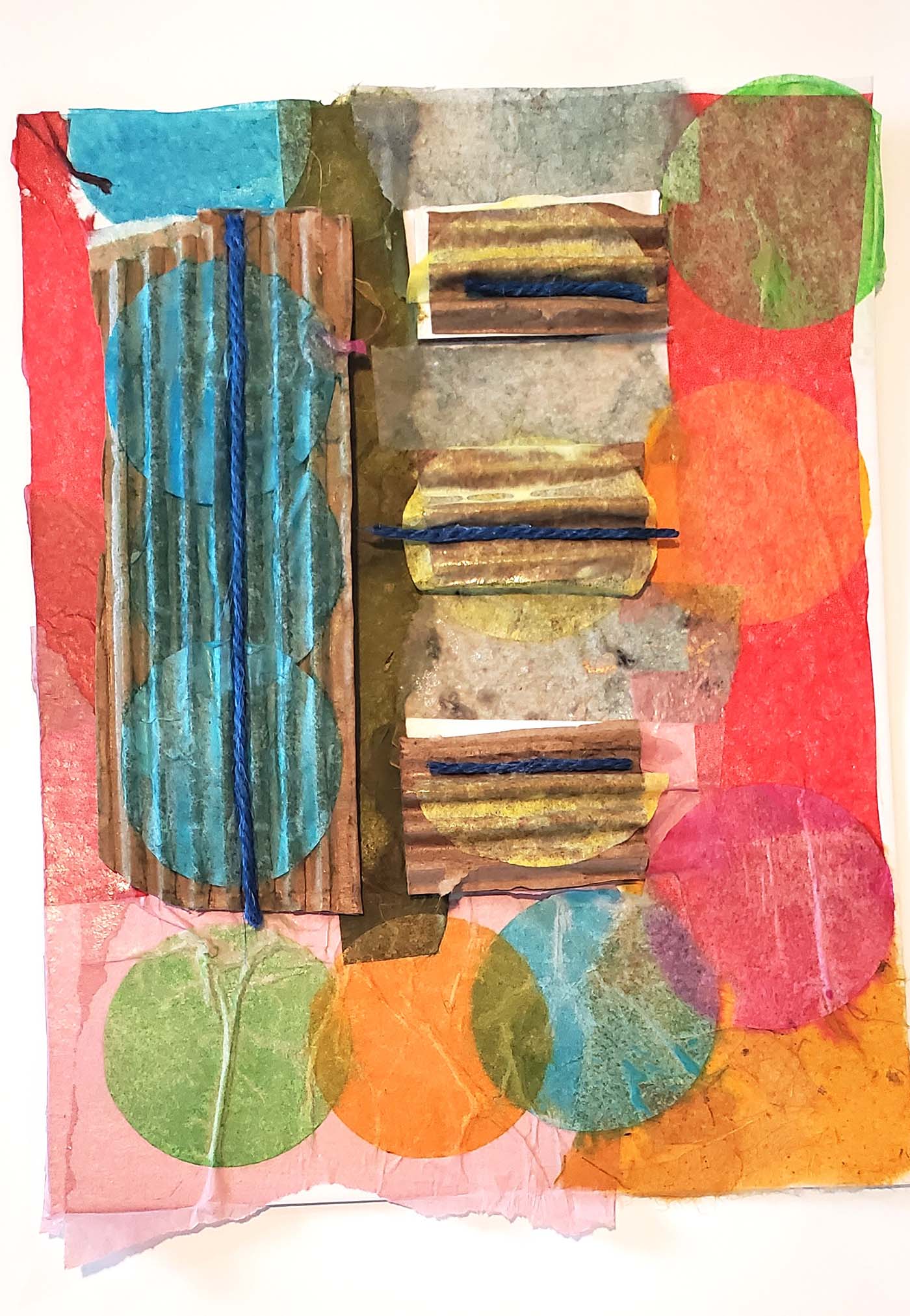 Colorful assemblage of crafting paper and cardboard 