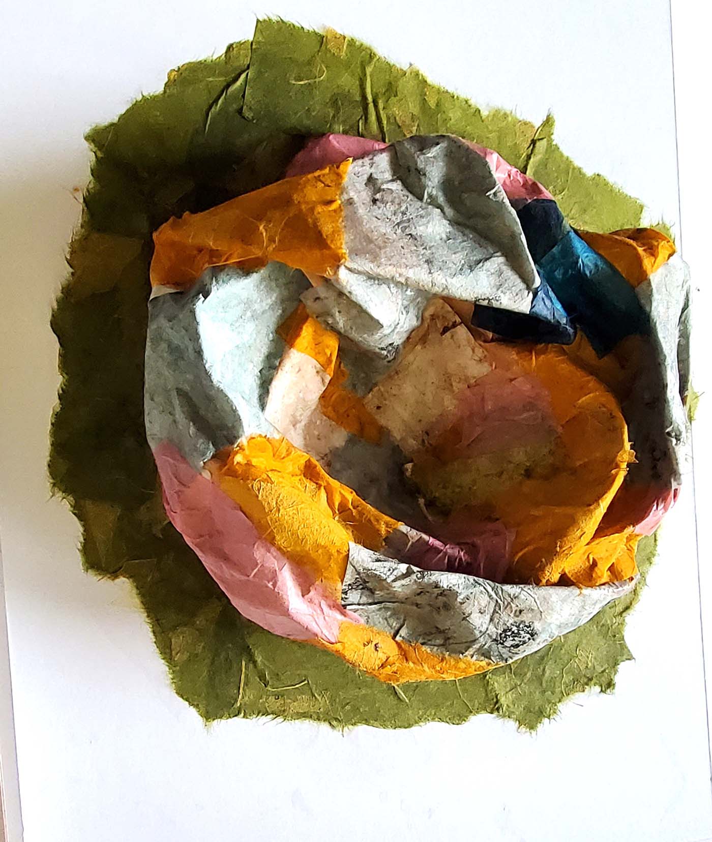 Colorful assemblage of crafting paper and cardboard 