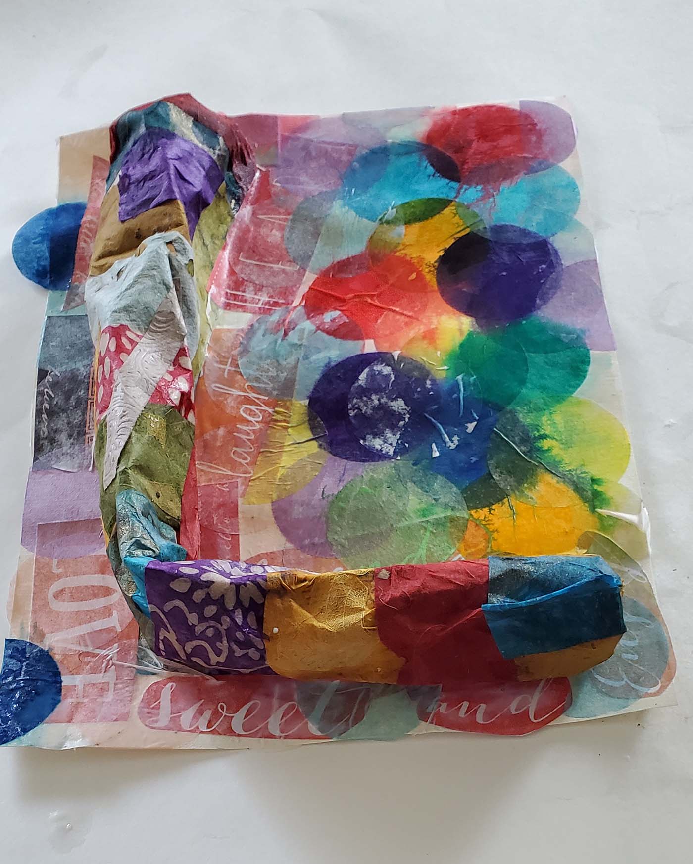 Colorful assemblage of crafting paper and cardboard 