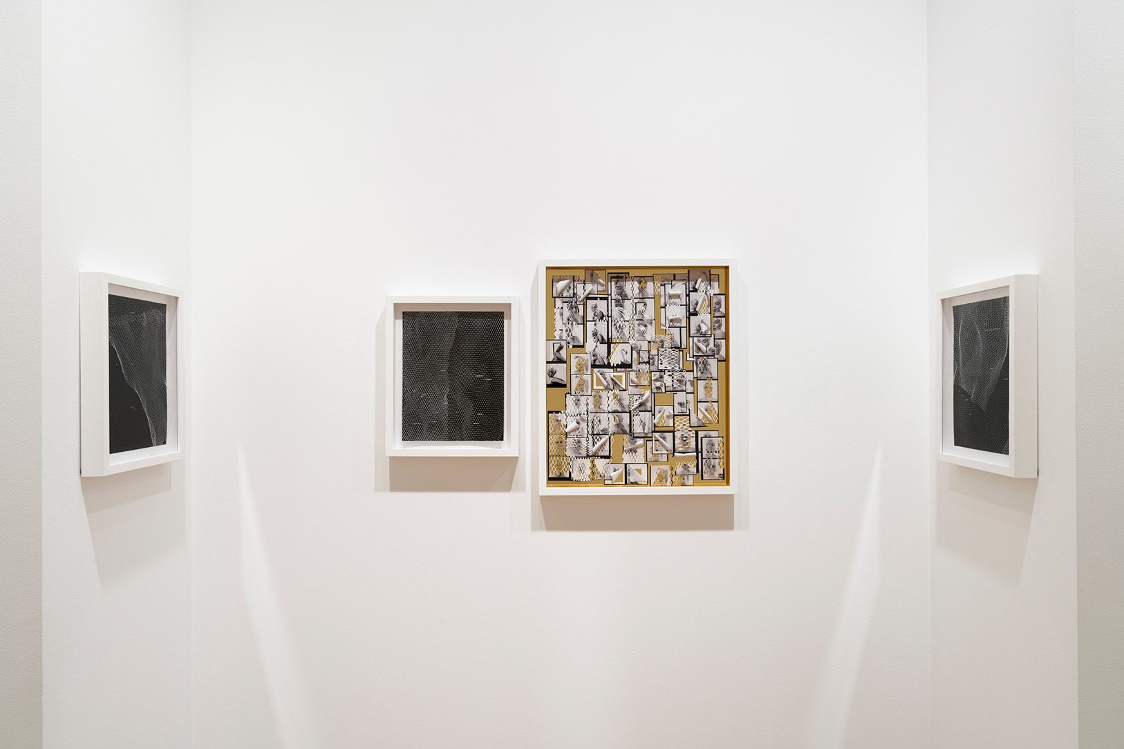 Collage based artworks hanging next to each other on a wall