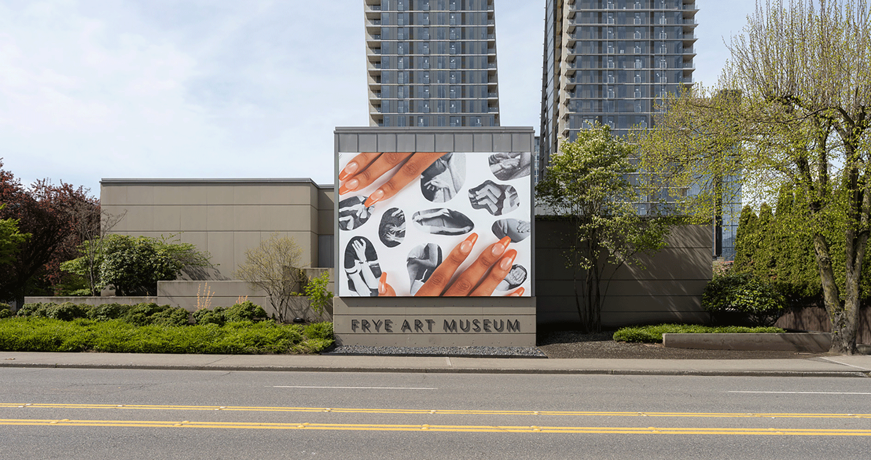 Installation view of Laura Hart Newlon's Boren Banner, two hands with orange nail polish placed over a collage of black and white photos of arms and legs