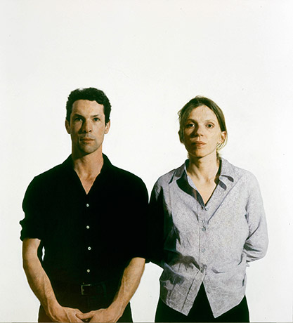 A painting of a man and a woman in modern, non-descript clothing facing towards the view