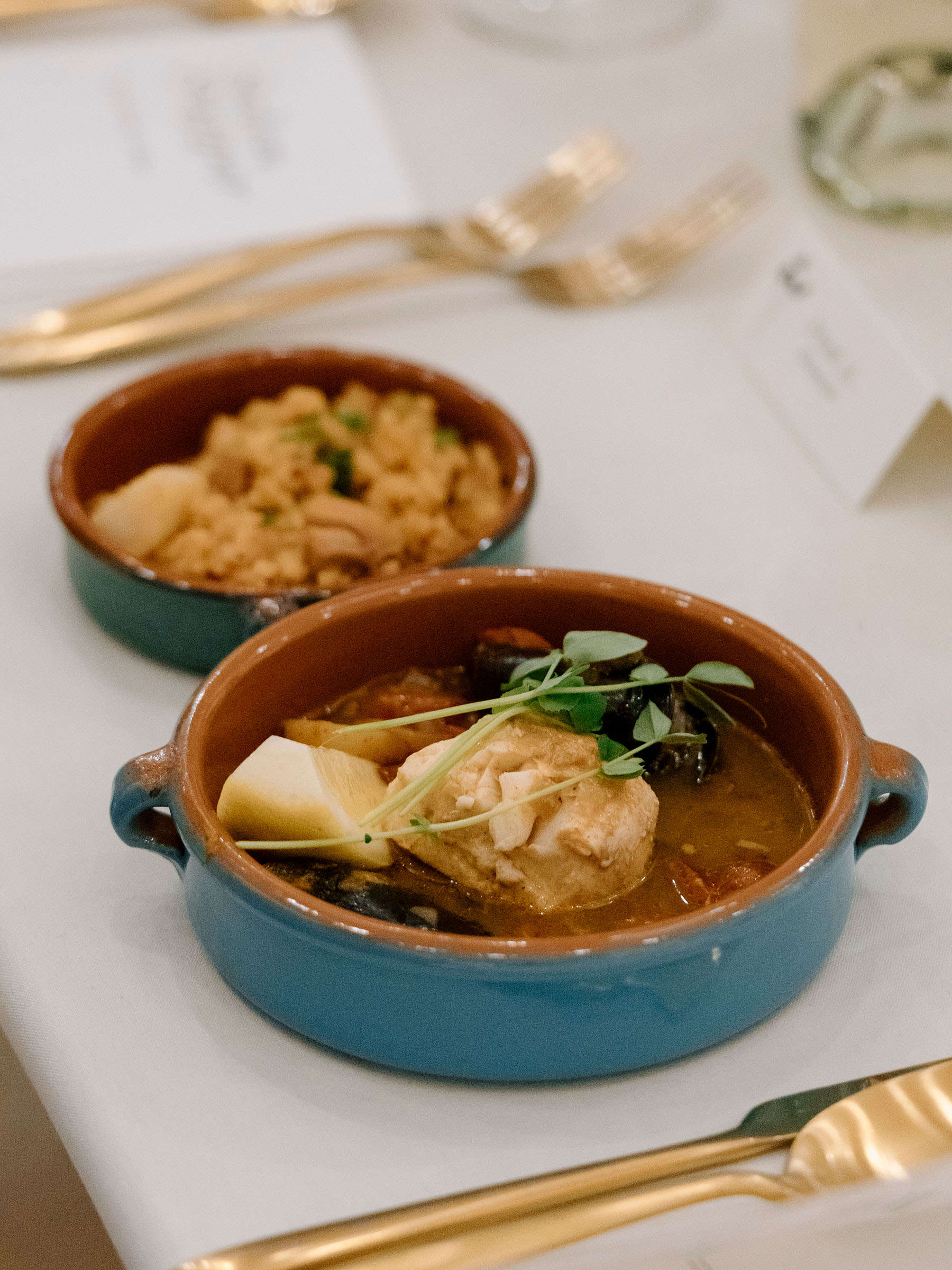 Food in small dishes on a table