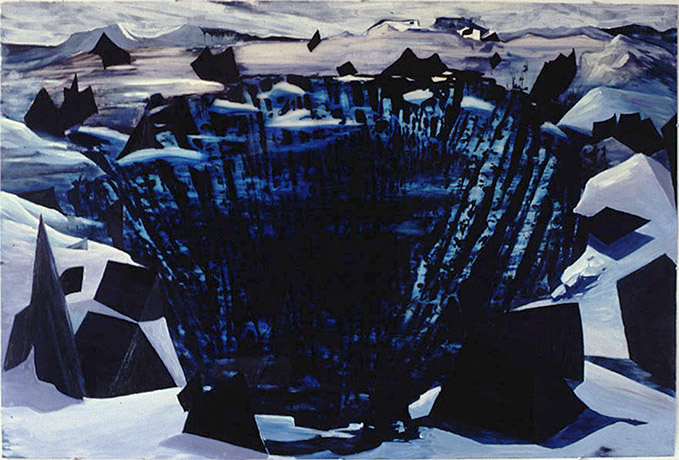 A snowy landscape with a large central crevasse