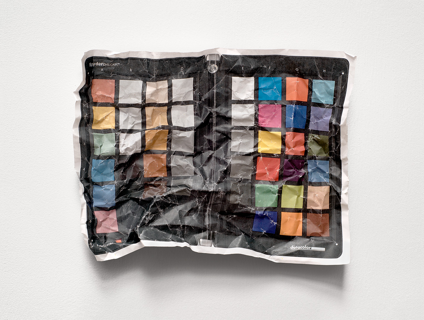 Stephanie Syjuco. Crumpled Calibration 1, 2021. Archival digital print. 15 x 20 in.