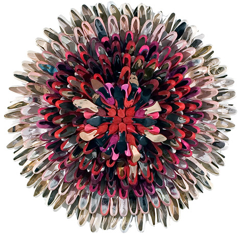 A sculpture made out of blow dryers