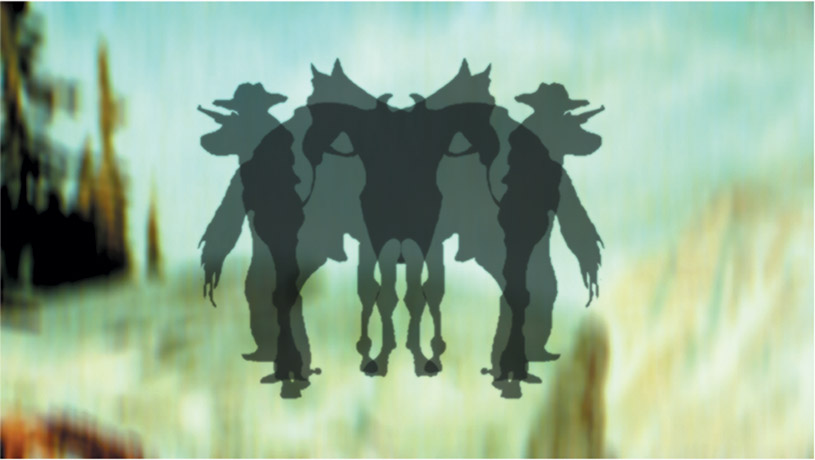 A still from a film with symetrical shadows of a cowboy and horse
