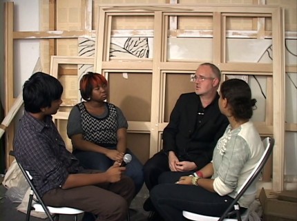 People sitting in a circle and talking