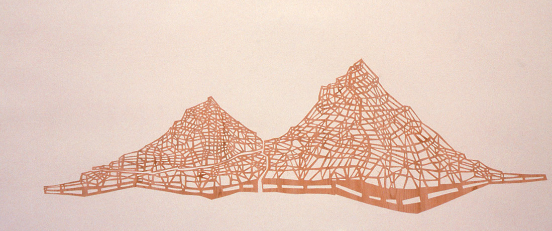 An abstract, geometric image of two mountains