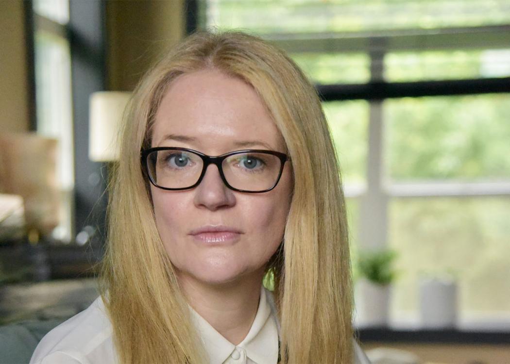 A photograph of a blonde woman