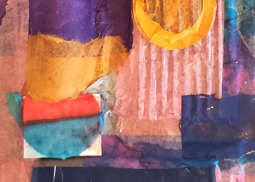 Colorful paper on a flat cardboard sculpture