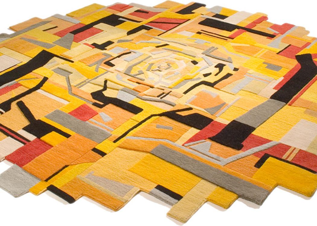 A large, circular, abstract wool artwork