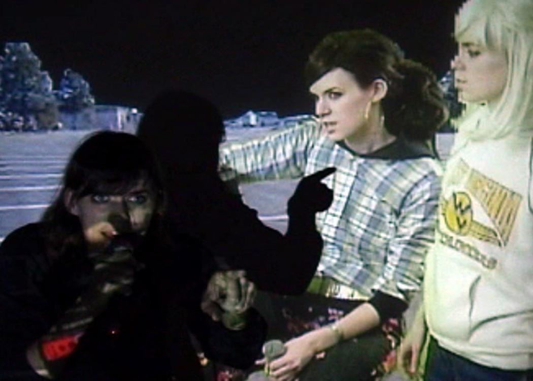 A still from a video of a band made up of three of the same person