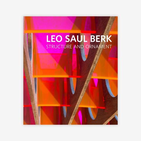 Book cover with photograph of wood and orange plastic